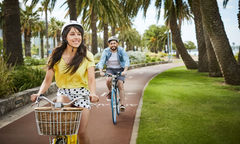 two people riding a bike