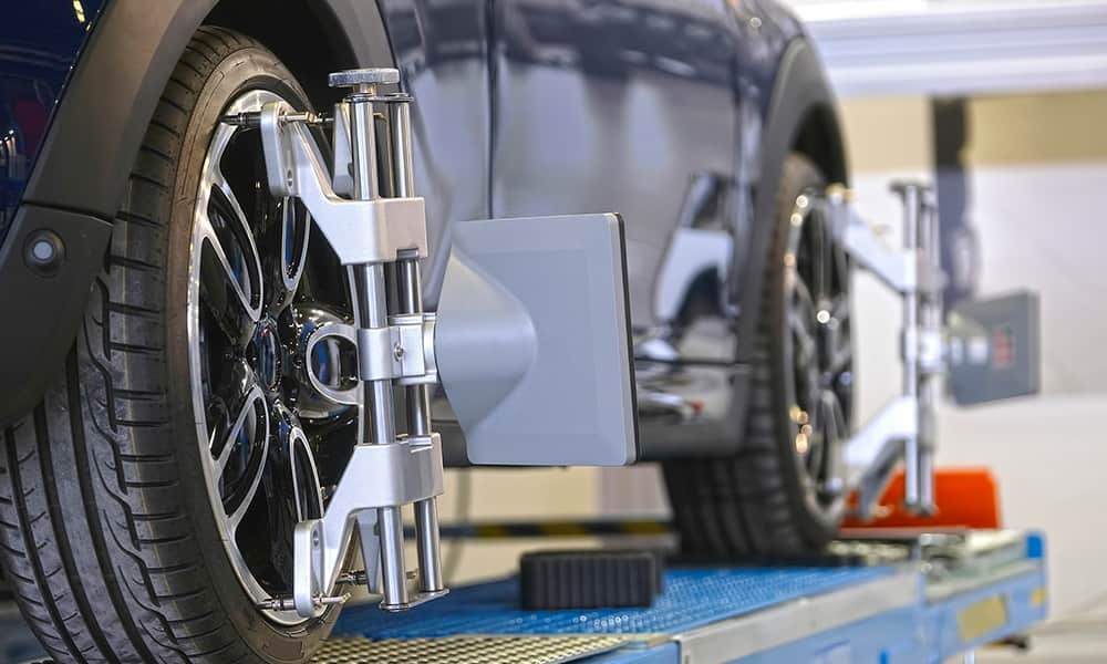 Car on platform in workshop