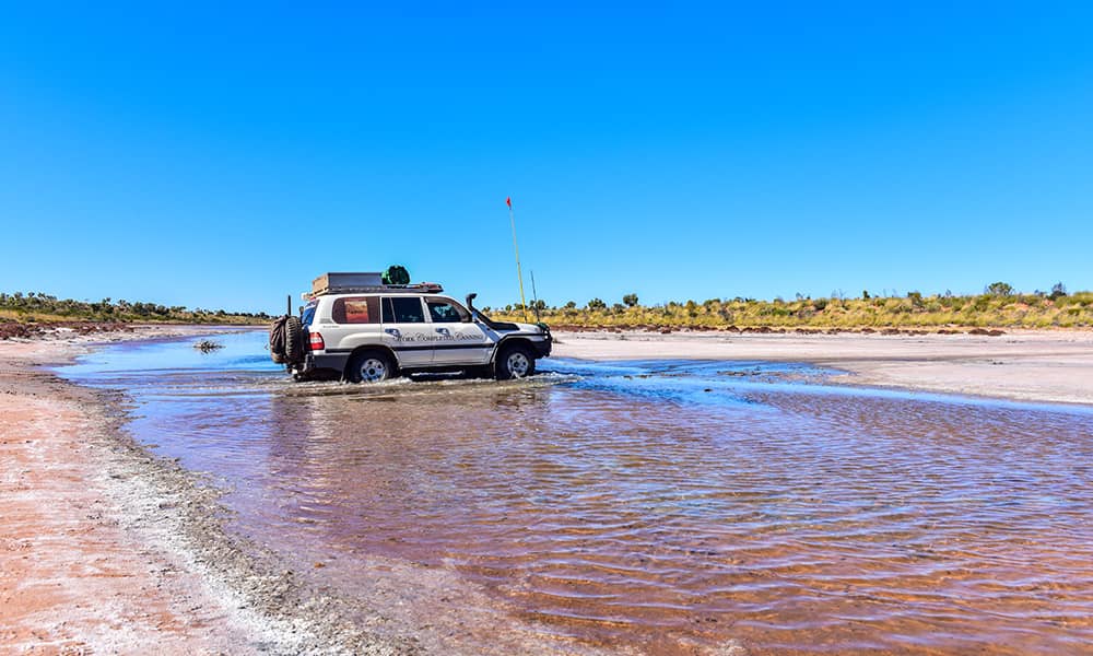 Four-wheel drive driving over water