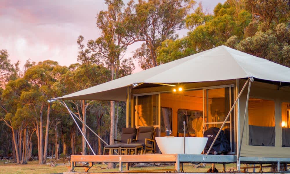 Glamping tent in nature at sunset