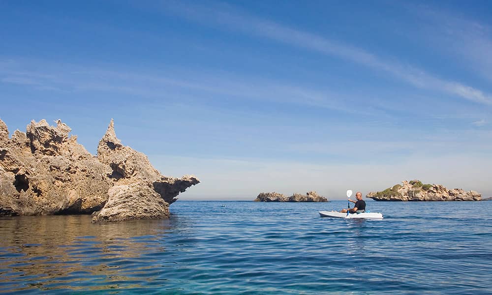 Man kayaking offshore at Rockingham