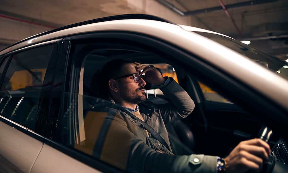 An annoyed driver waiting in a multi storey carpark