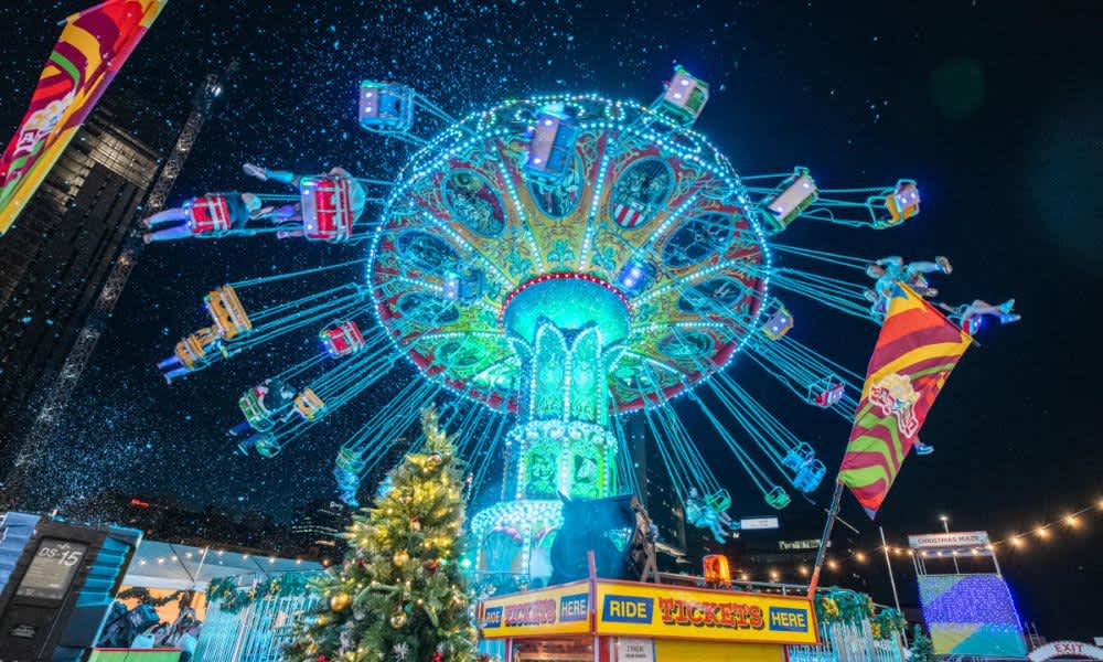carnival ride at Elizabeth Quay fun fair at nighttime