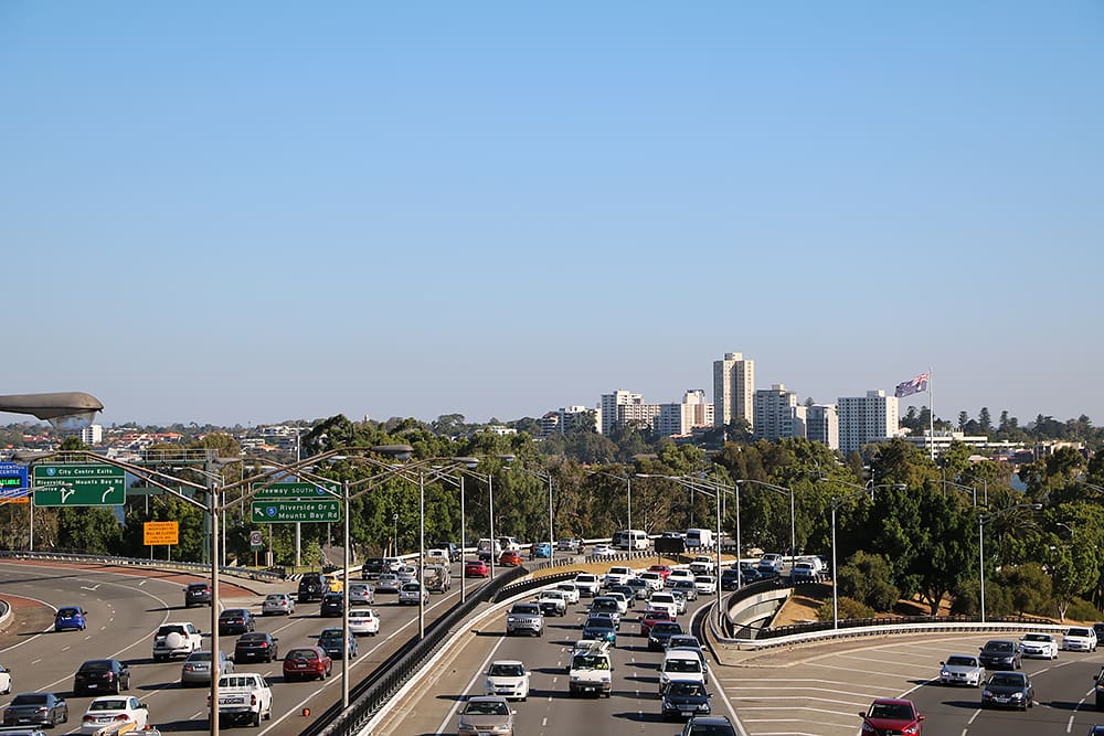 Cars on Kwinana Freeway seen travelling in both directions.