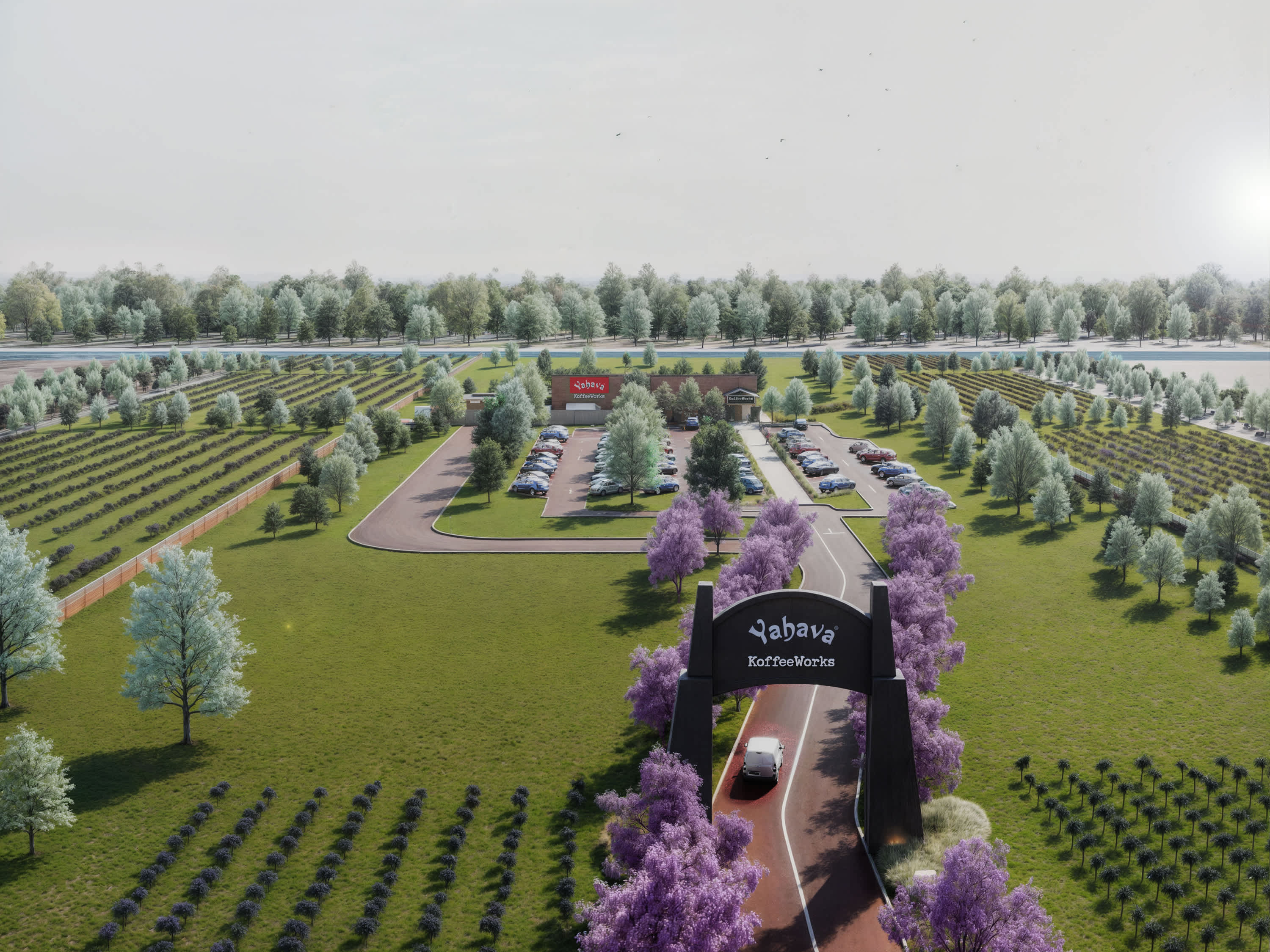 An artists impression aerial view of the entry to the new Yahava KoffeeWorks surrounded by green fields and a sign entryway