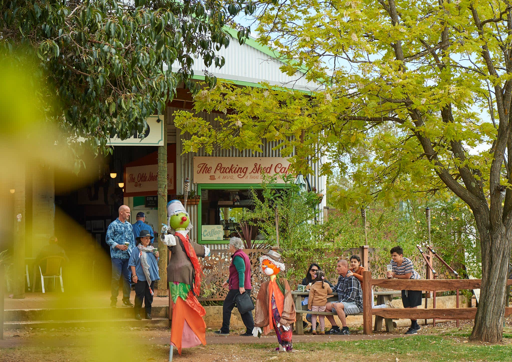People having coffee outside a country cafe in Western Australia