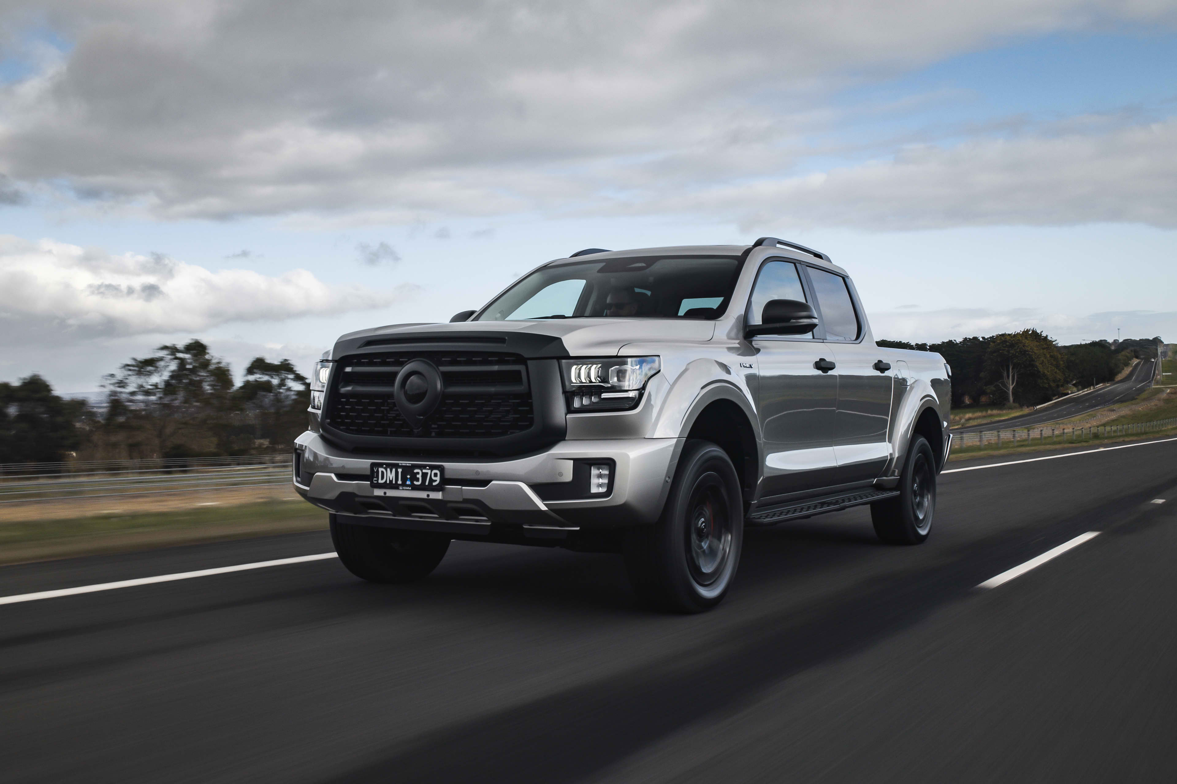 Front view of 2025 GWM Cannon Alpha PHEV being driven on the road
