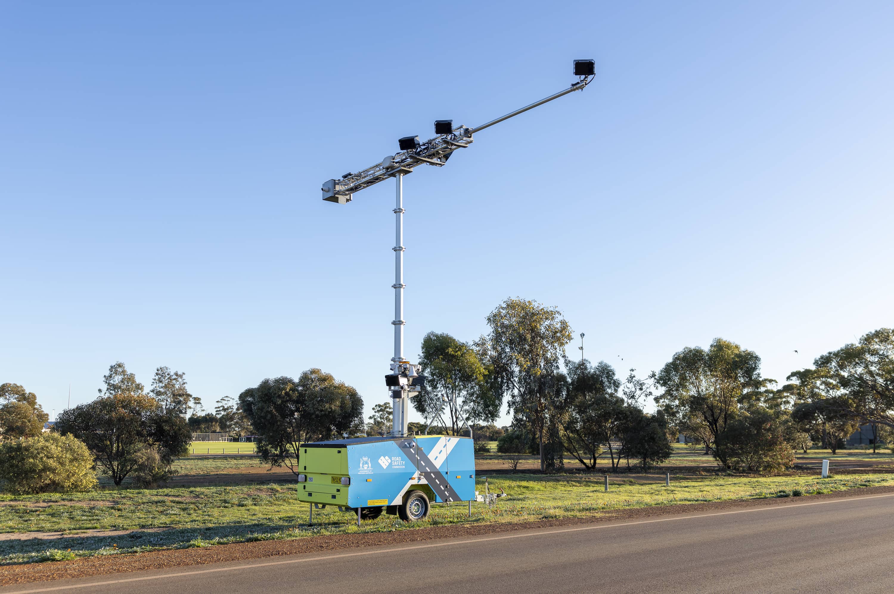 A mobile road safety camera set up over a road